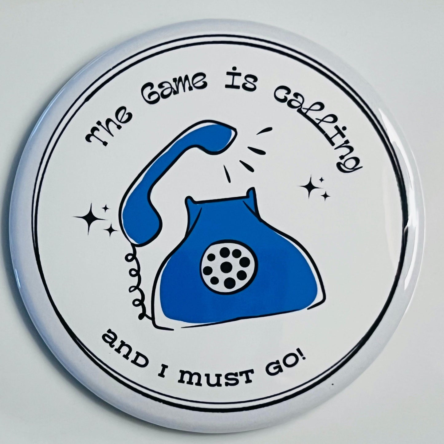 Round button with blue phone illustration and text on a white background