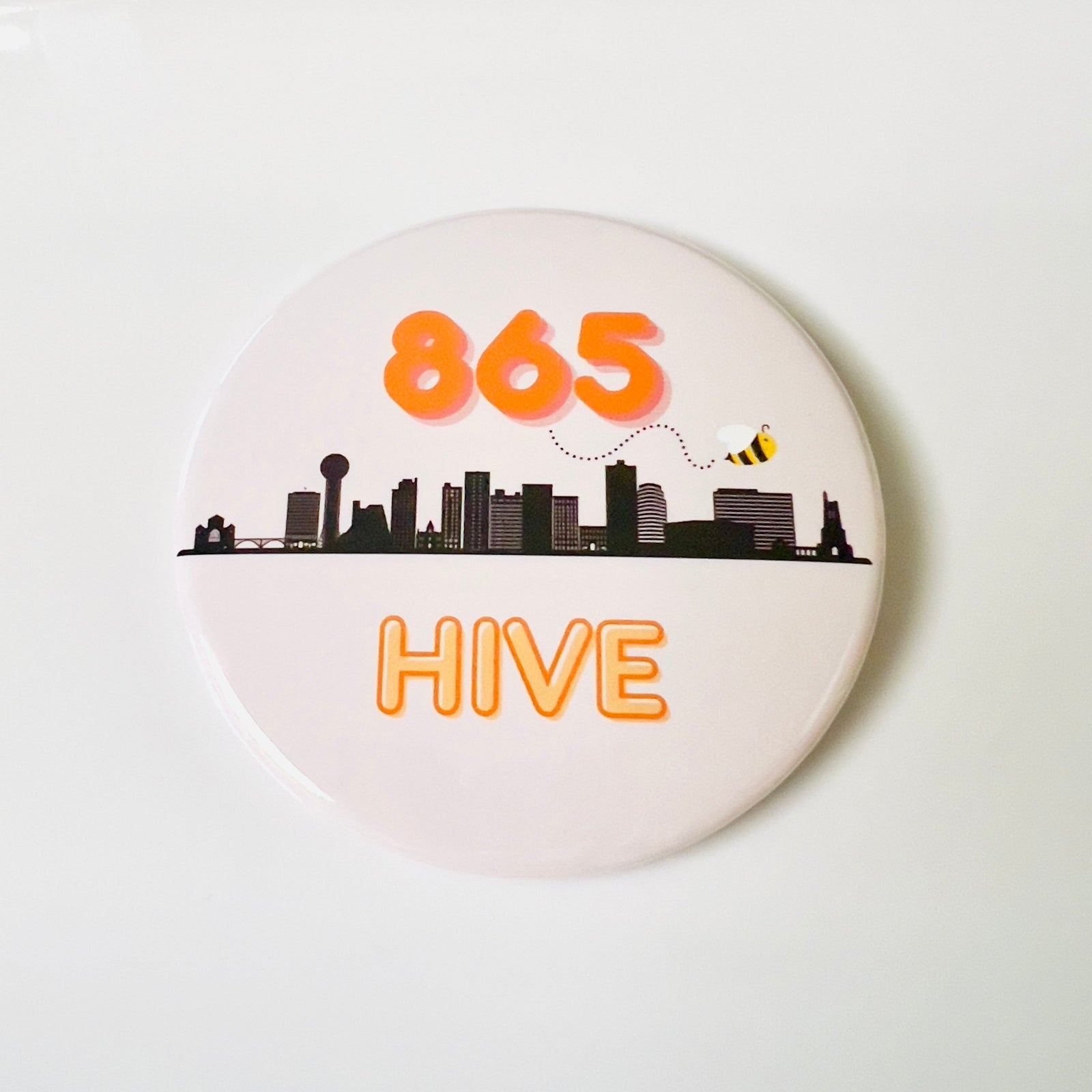 Button badge with '865 Hive' text and Knoxville skyline design on a white background