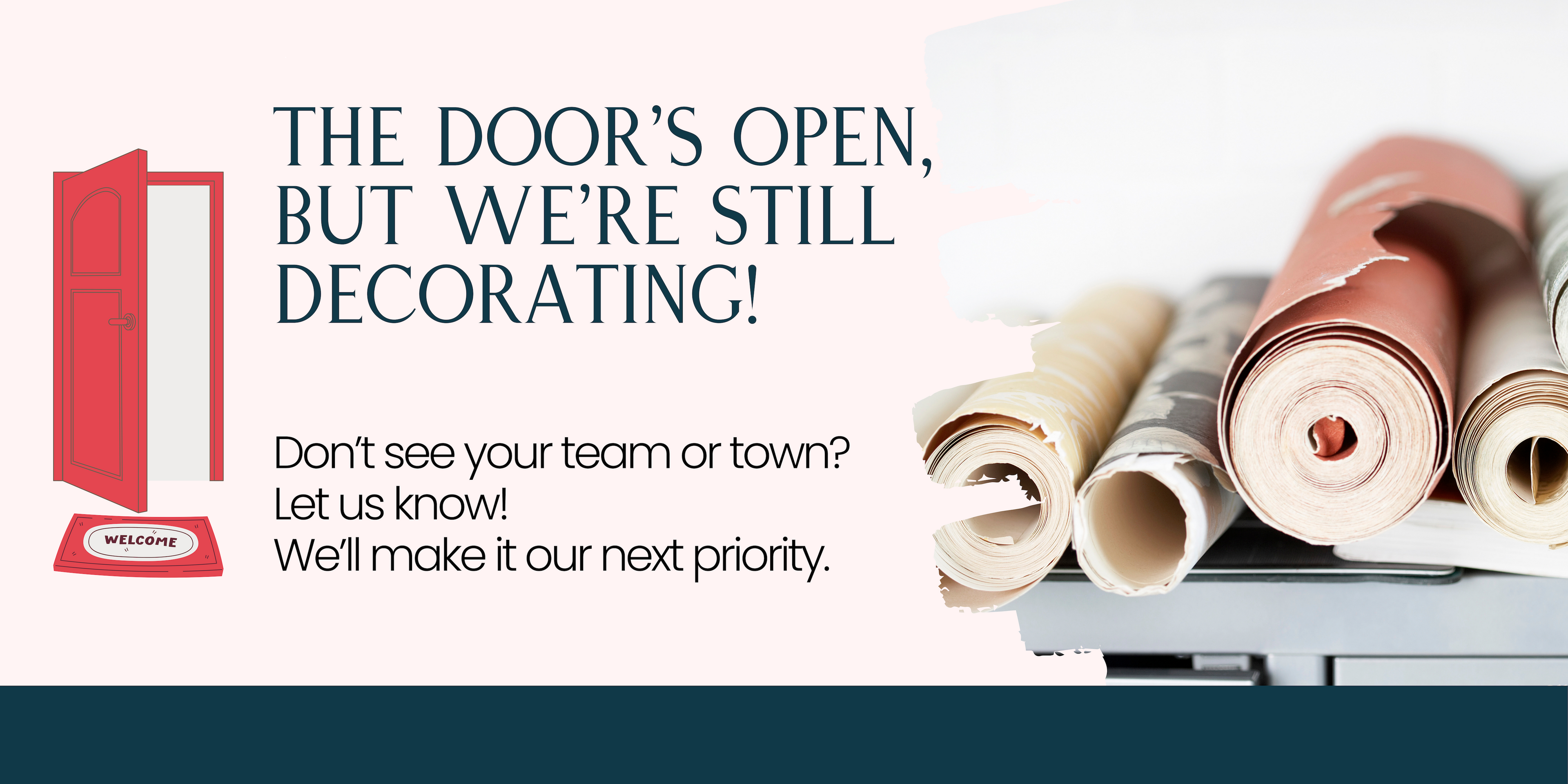 Open red door with welcome mat, wallpaper rolls and text 'the door's open but we're still decorating' on a pale pink background